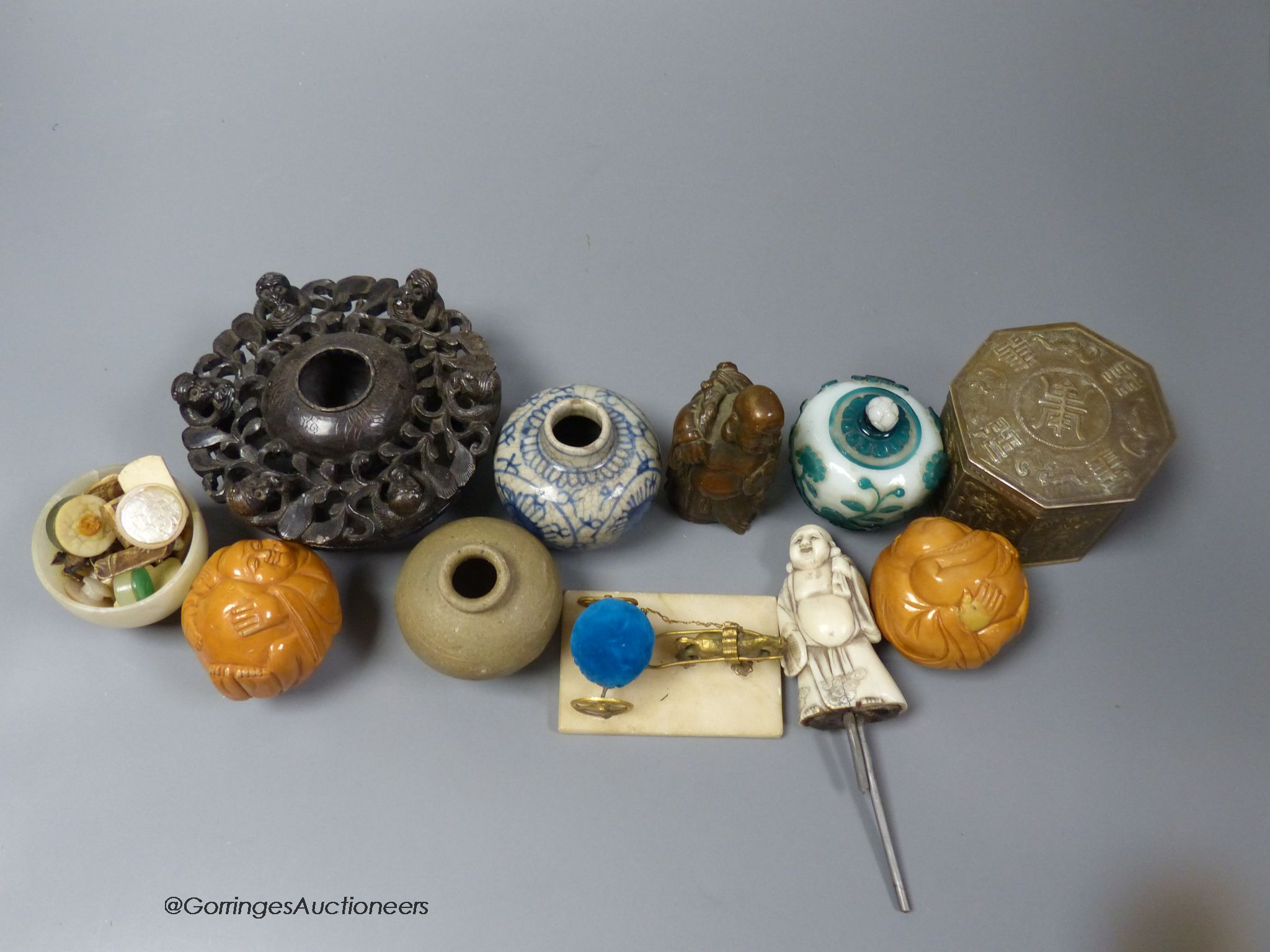 A collection of Chinese decorative pieces including glass, ceramic, metal and mineral